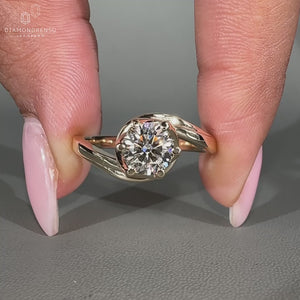 Round Cut Diamond Ring in a bypass ring setting.

