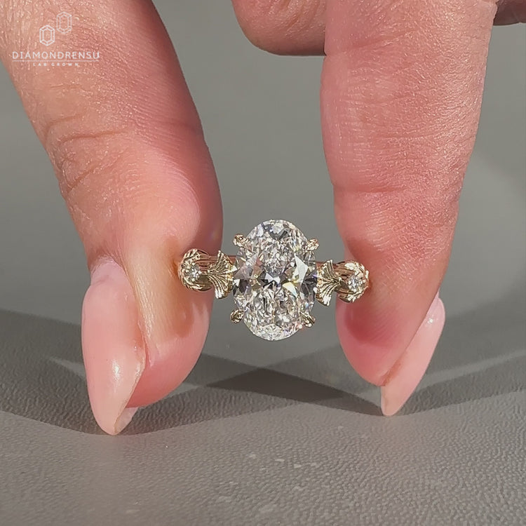 Handmade vintage diamond ring with round side stones.
