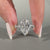 Marquise Cut Diamond Ring in white gold with hidden halo.

