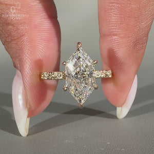Marquise diamond ring sunflower detail art deco style.
