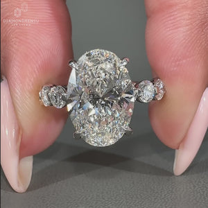 Pave band matched with 4 claw prong setting.
