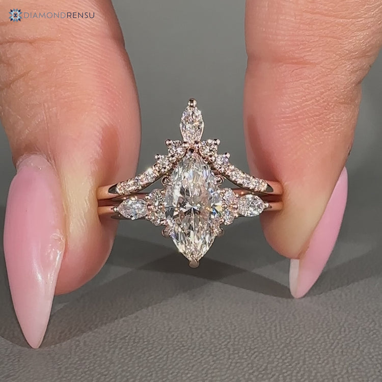 Marquise bridal set with Muse setting and six claw prongs.
