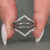 Round Diamond Band designed in V shape white gold style.
