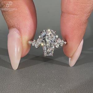 Coffin diamond ring cluster style prong setting.