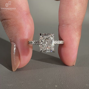 Pave setting paired with a round cut pave band.
