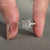 Pave setting paired with a round cut pave band.

