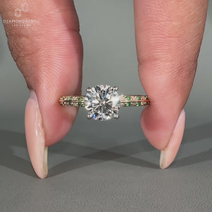 Two-tone diamond engagement ring in yellow and white gold.
