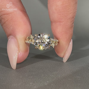 Old European cut round ring pave nature inspired.
