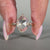 Oval rose diamond ring solitaire open gallery setting.
