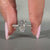 Coffin diamond ring round pave band cathedral set.
