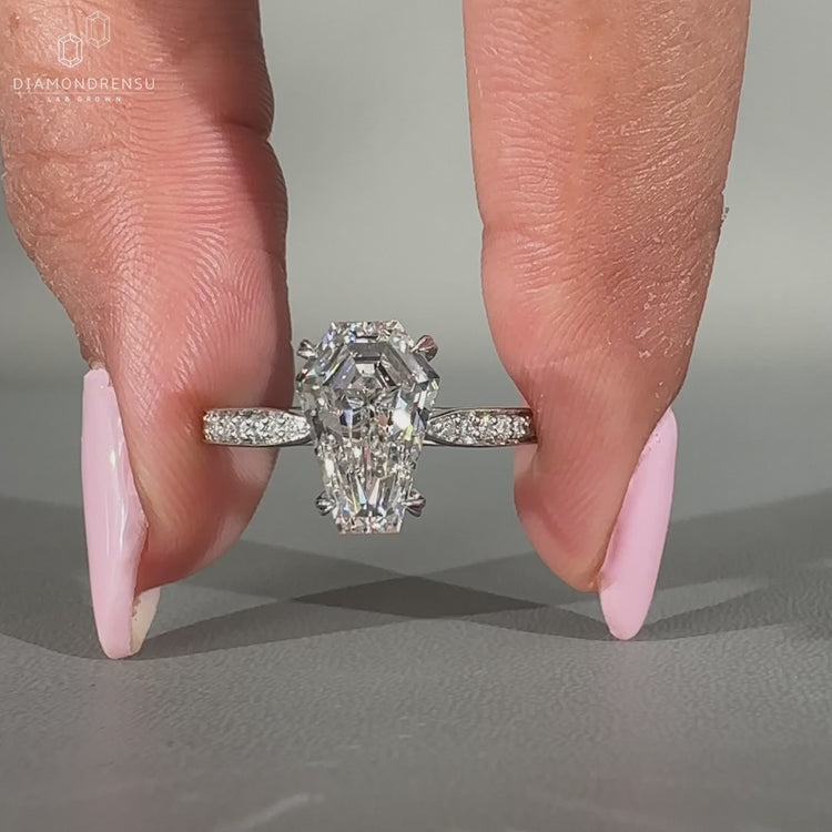 Coffin diamond ring round pave band cathedral set.
