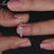 Zig zag wedding band paired with an elegant centre stone.
