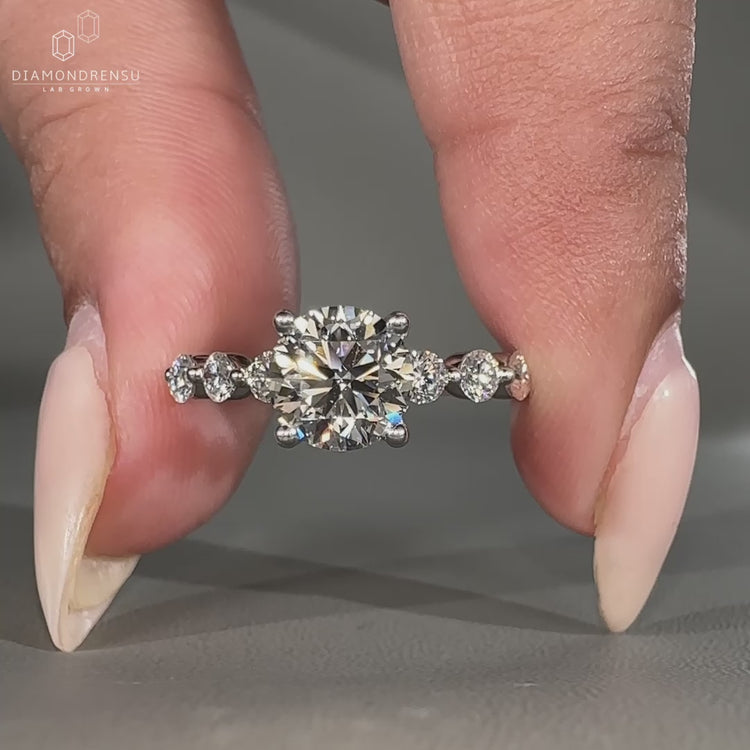 Round cut diamond ring and 4 prong setting.
