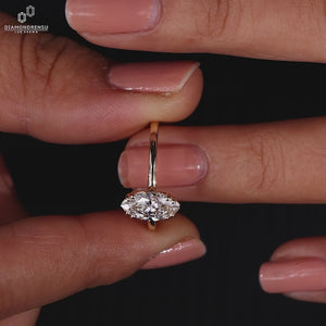 Solitaire diamond ring with double prong setting.
