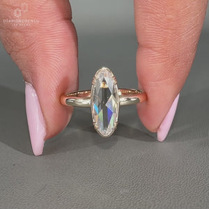 Moval rose diamond ring solitaire double claw setting.
