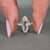 Moval rose diamond ring solitaire double claw setting.
