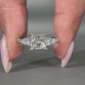 4 prong setting made with cathedral setting ring.
