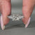 4 prong setting made with cathedral setting ring.

