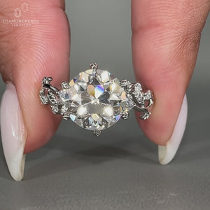 Leaf style pave band with 6 leaf style prong.
