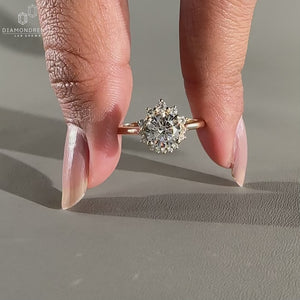 Round cut halo setting used in 4 prong setting.

