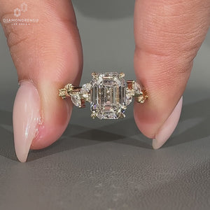 Handmade emerald old European cut engagement ring design.
