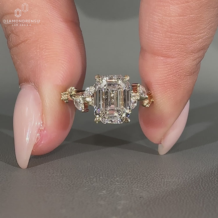 Handmade emerald old European cut engagement ring design.
