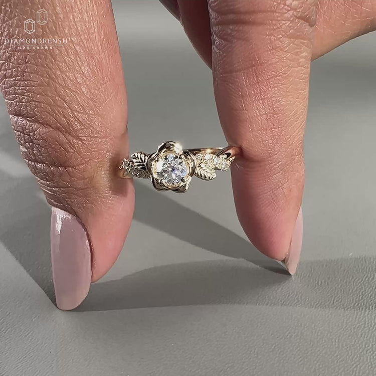 Round diamond ring twisted pave floral design.