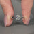 Round diamond ring pinched shank six claw prong set.
