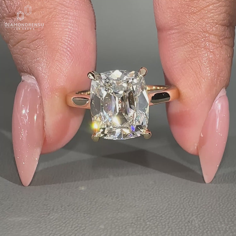 Cathedral setting ring with 4 claw prong setting.
