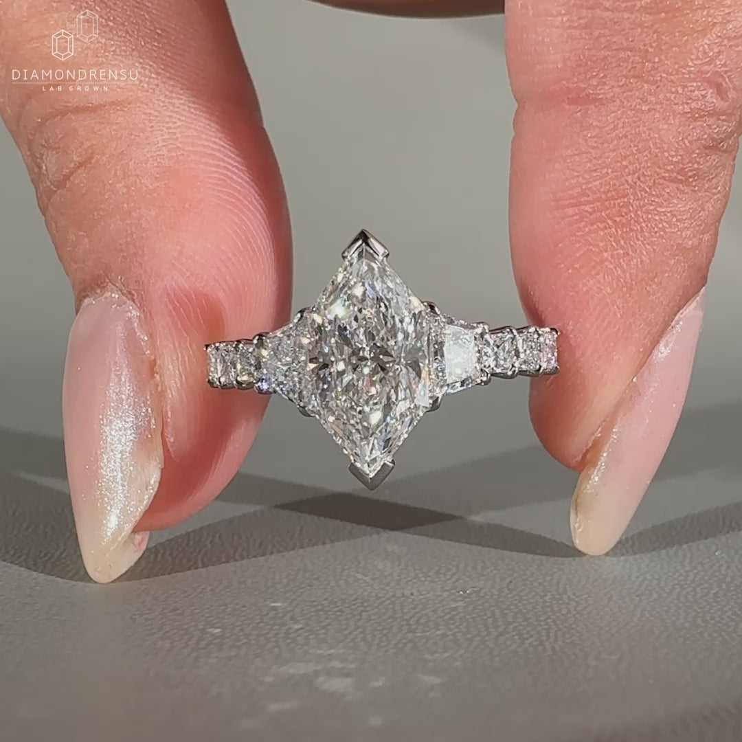 Trapezoid Brilliant Cut Ring with tapered shank design.
