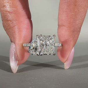 Pear radiant diamond ring toi et moi pave band.
