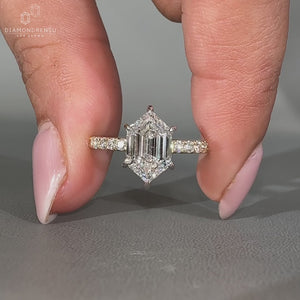 Handmade hexagon step cut diamond ring with pave setting.
