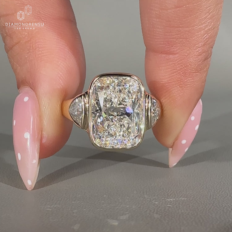 Three stone Cushion Cut Diamond Ring bezel setting.
