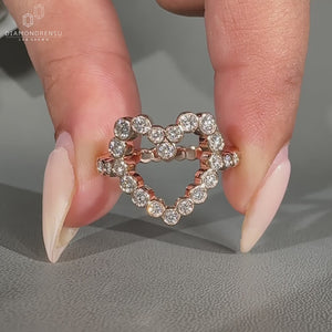 Handmade bezel diamond ring with pave setting.
