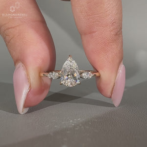 Handmade pear cut diamond ring in three stone style.
