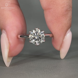 Tapered shank ring with cathedral setting ring.
