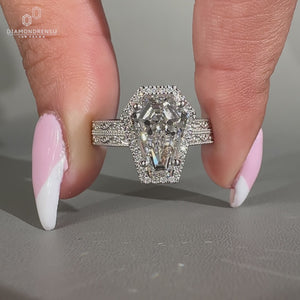Coffin cut ring double row pave halo milgrain style.
