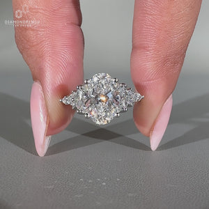 Handmade oval diamond ring in muse setting.
