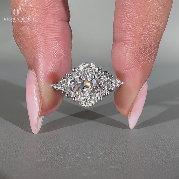 Handmade oval diamond ring in muse setting.
