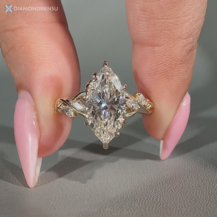 Nature inspired marquise cut diamond ring.