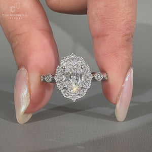 Oval Shaped Diamond Engagement Ring in a vintage milgrain setting.
