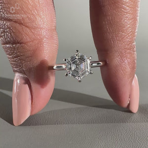 Solitaire diamond ring with 6 claw prong setting.
