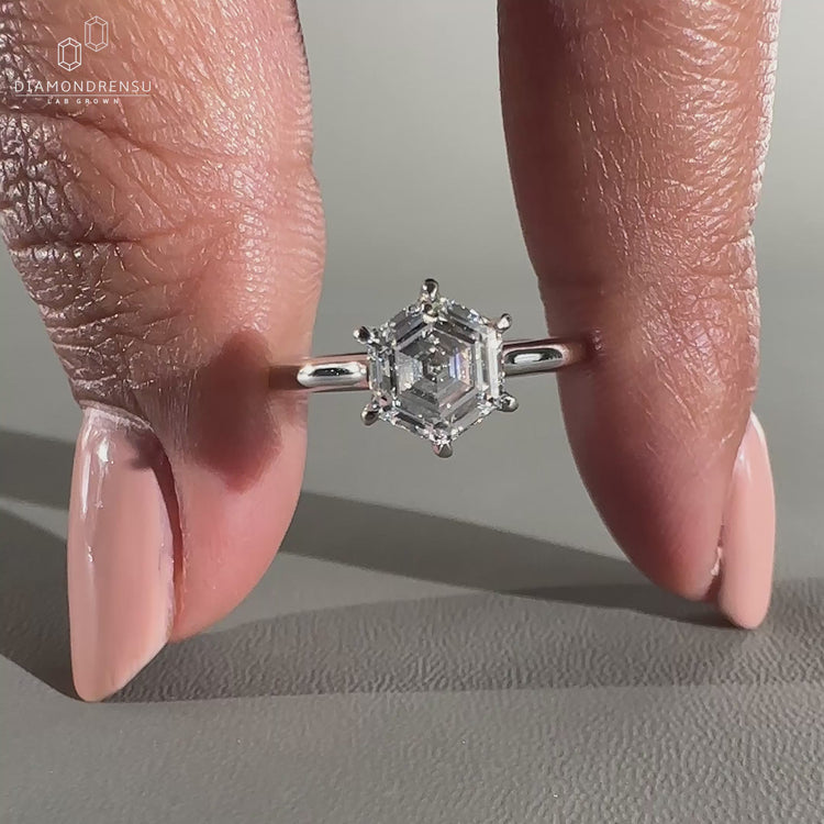 Solitaire diamond ring with 6 claw prong setting.
