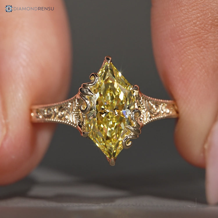 Yellow diamond Dutch marquise solitaire ring.