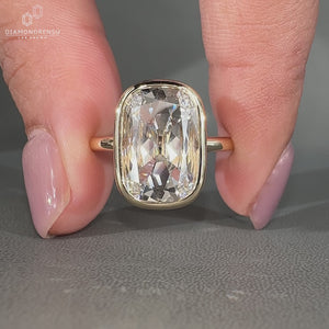 Handmade bezel diamond ring in solitaire style.