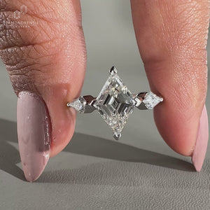lozenge cut diamond ring in white gold engagement ring.
