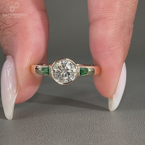 3 stone ring made with Tapered Baguette side stone.

