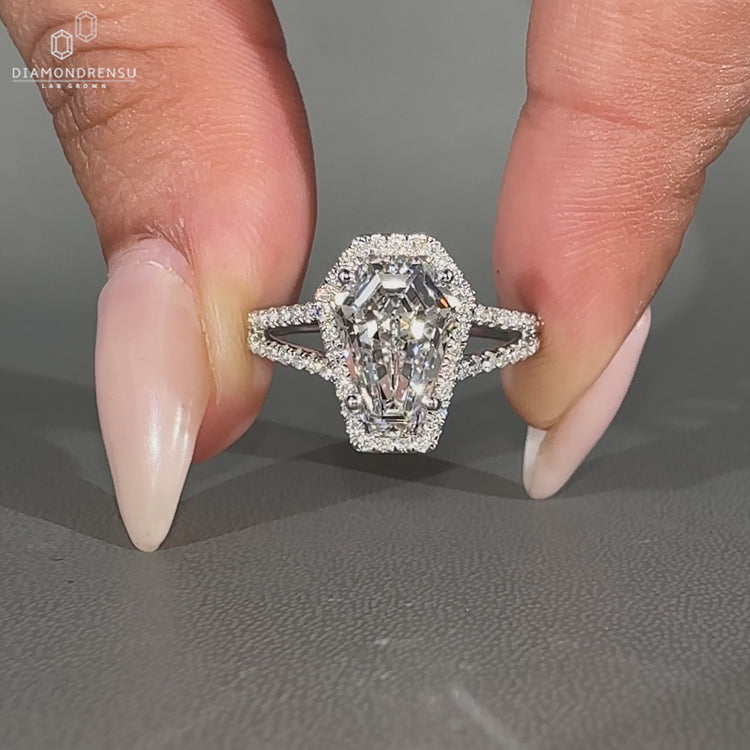 Coffin diamond ring pave band cathedral setting.