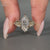 Marquise diamond ring with pave round diamond nature.