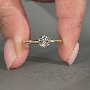 Round diamond ring solitaire six claw prong setting.
